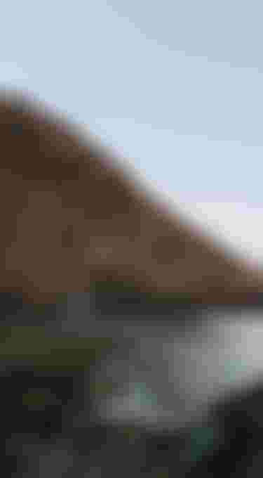 Maria Behrens on the cost of Tenerrife wearing a blue wetsuit