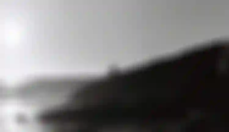 Header Videos ion bike sunset beach water rocks