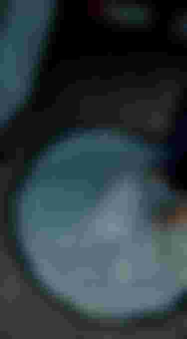 Person standing on a changing mat with ION logo