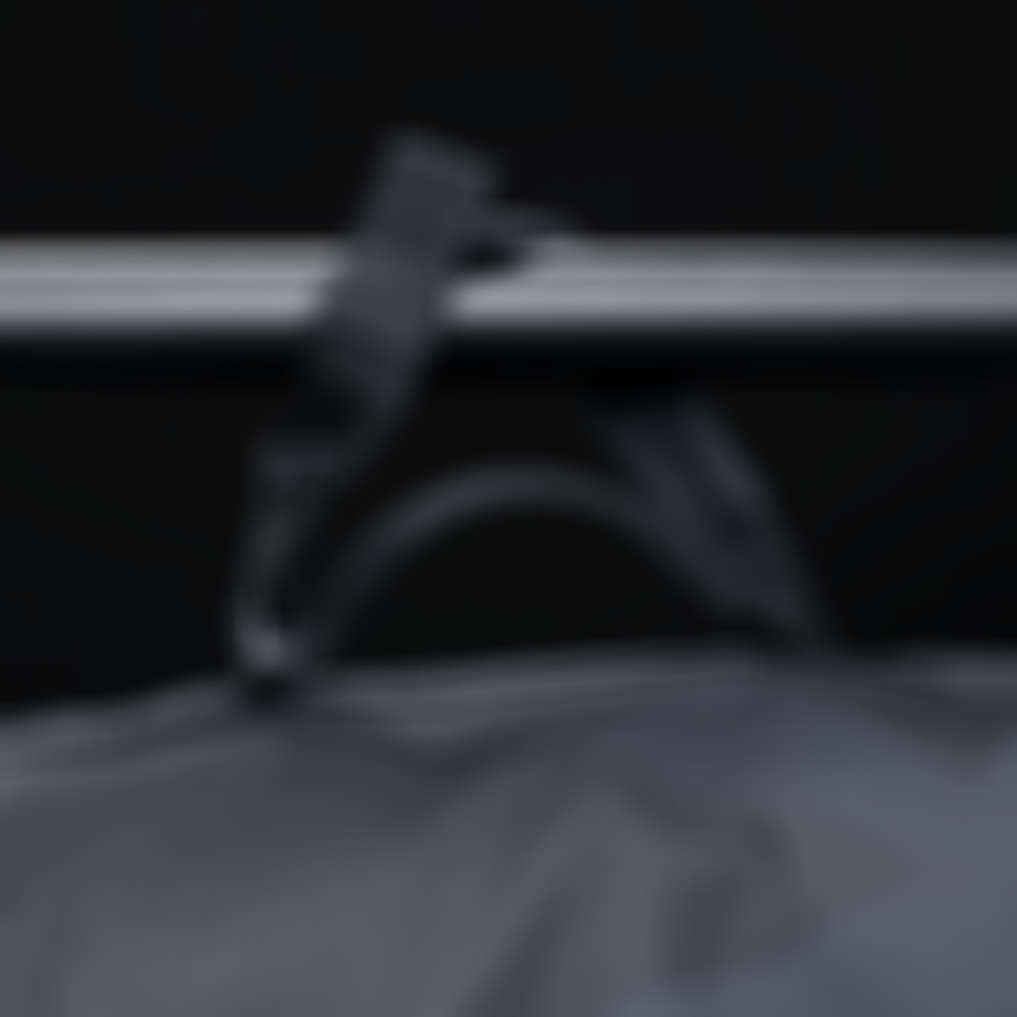 Close up of a bag handle wrapped around a rail