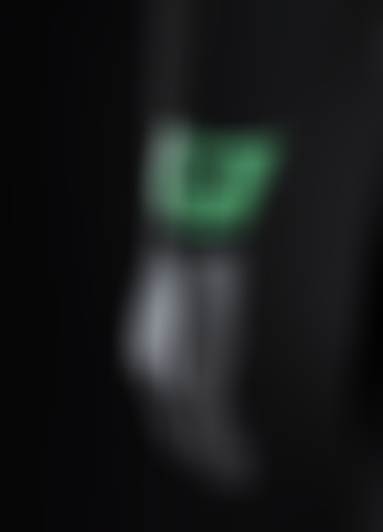 close up of size graphic on the left sleeve of a black wetsuit