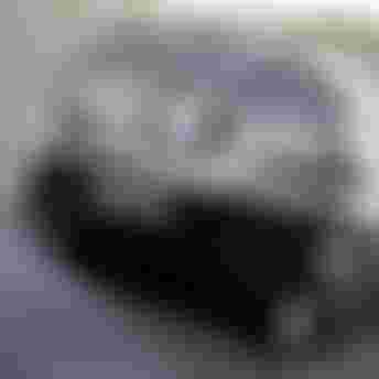 Grey gearbag lying on the ground