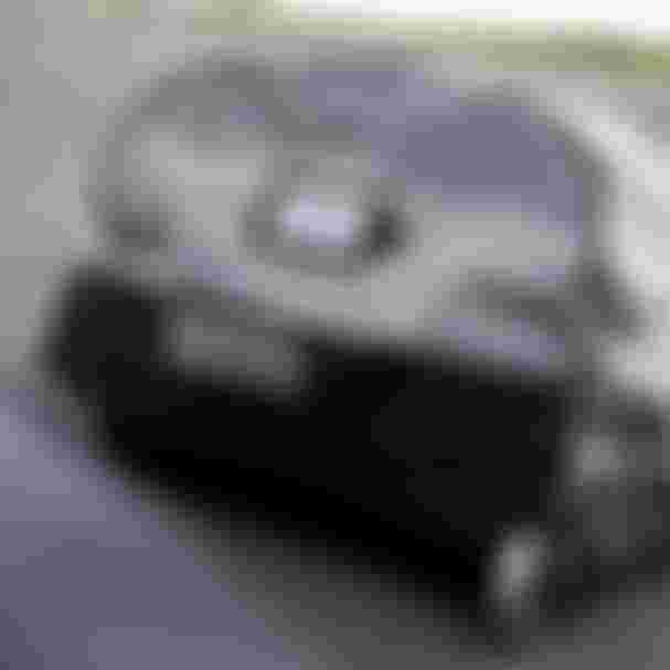 Grey gearbag lying on the ground