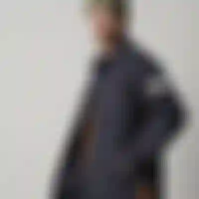 Man wearing a black insulated jacket from ION and an olive grean beanie