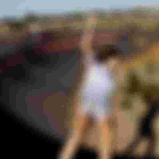 Woman skating on an asphalt pump track