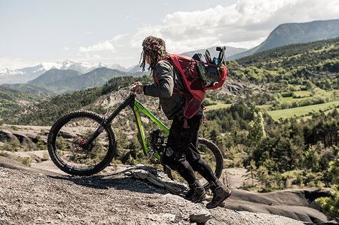 ION Bike SAS-TEC spine plate back protector during mountain biking in alpine terrain