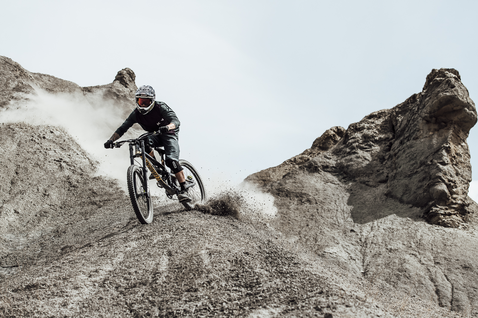 ION K-Pact knee pads during mountain biking on a rocky downhill trail