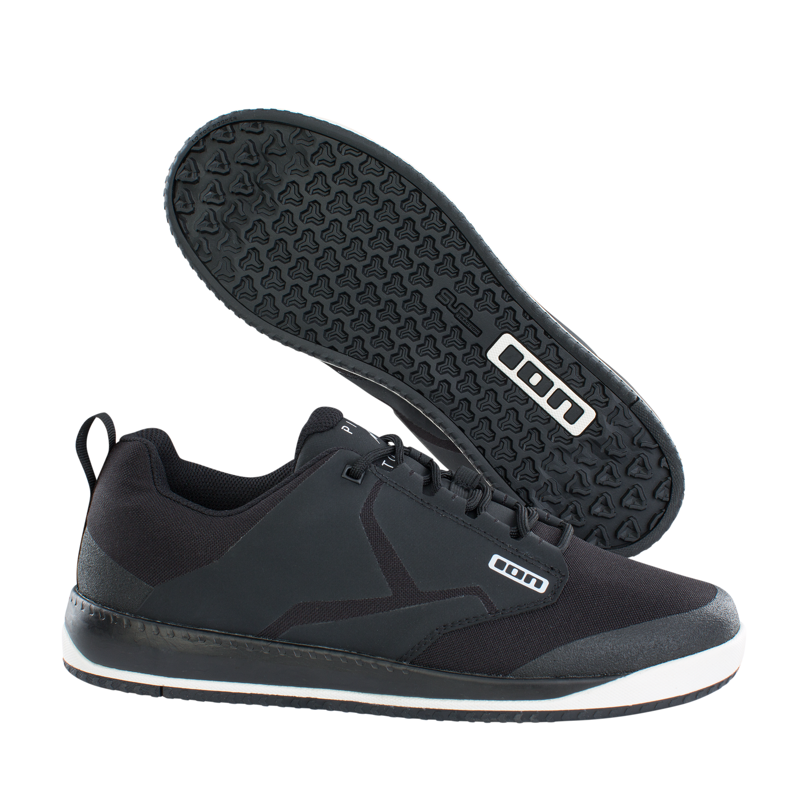 ION Scrub flat pedal bike shoe in black – side profile and outsole view with Pin Tonic 2.0 tread