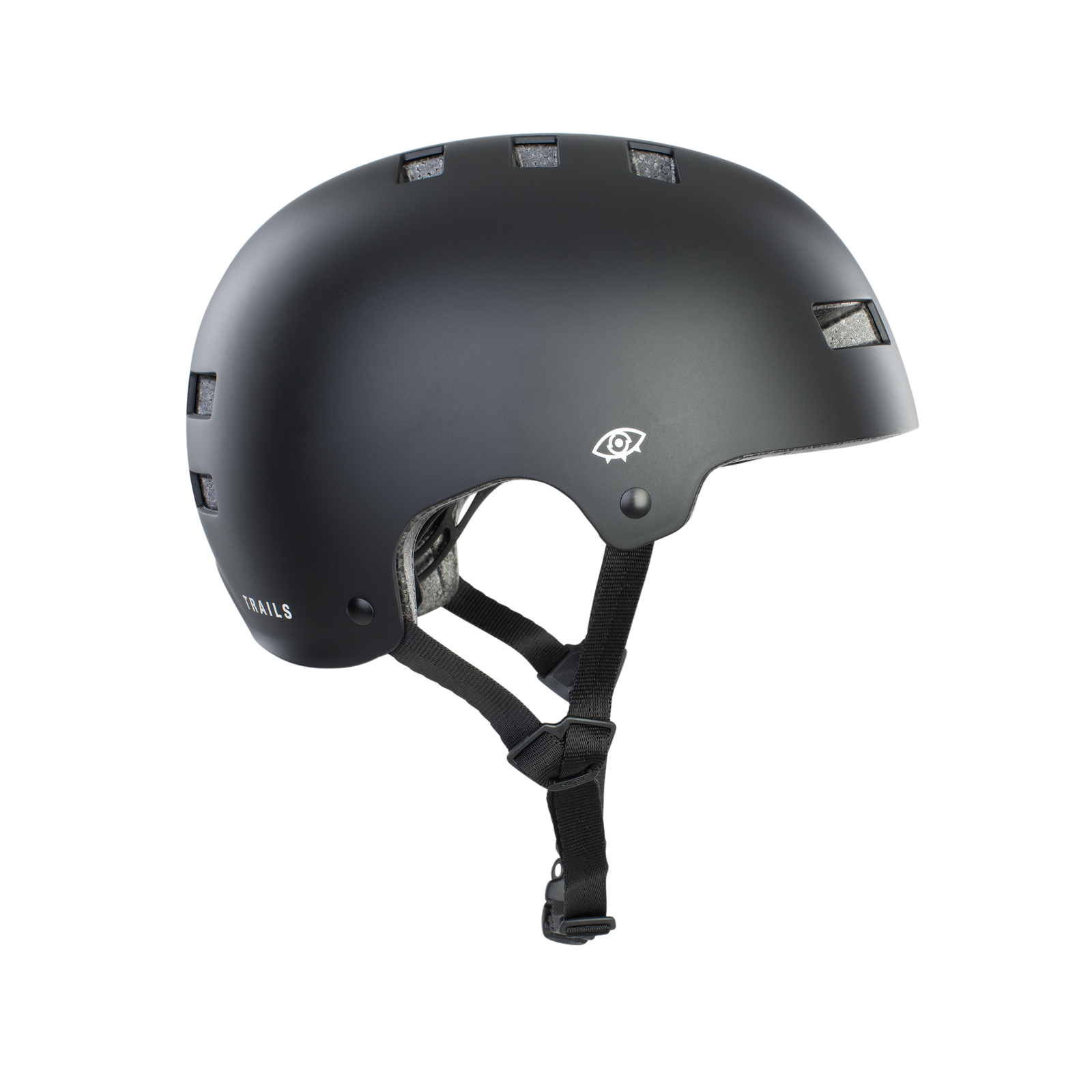 ION Seek helmet in matte black, left side view, CE certified, for dirt jump and skate park riding