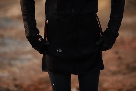 ION Neo Cosy Coat Core manteau néoprène femme en noir avec détails corail