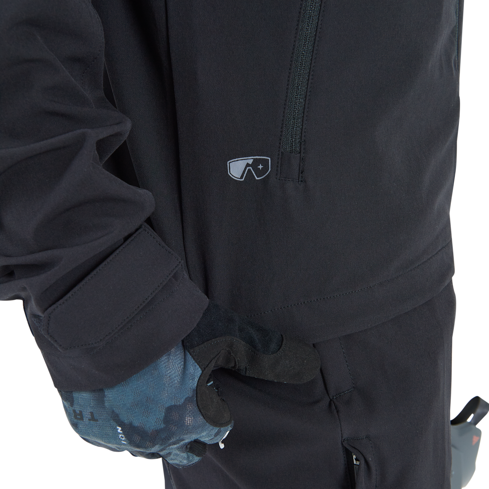 ION Shelter 4W Softshell cycling jacket in black for mountain biking, chest pocket detail view