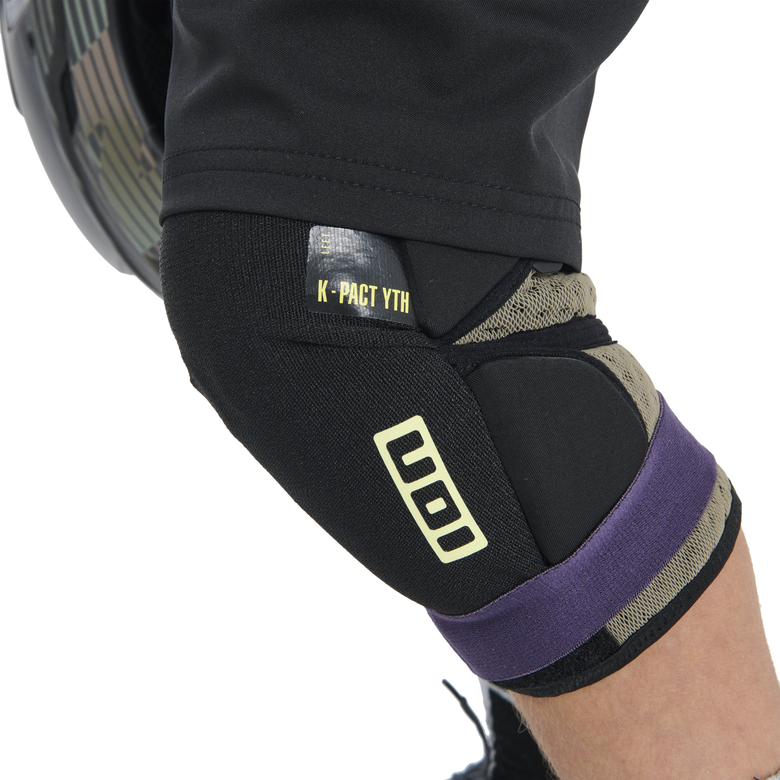 ION K-Pact YTH youth knee pads in black and purple with SAS-TEC padding, worn on knee