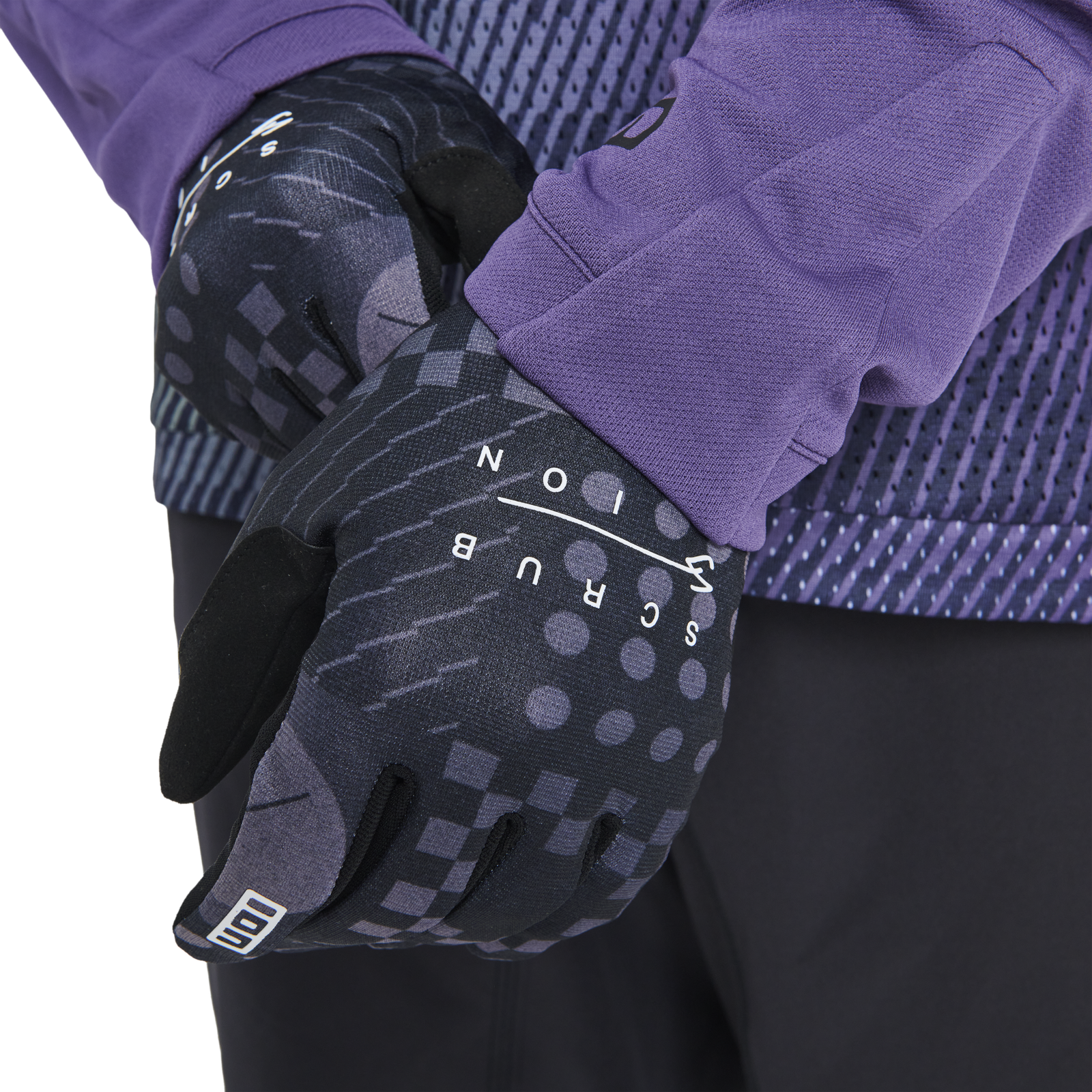 ION Bike Scrub full-finger cycling gloves in dark charcoal with silicone grip pattern, on model