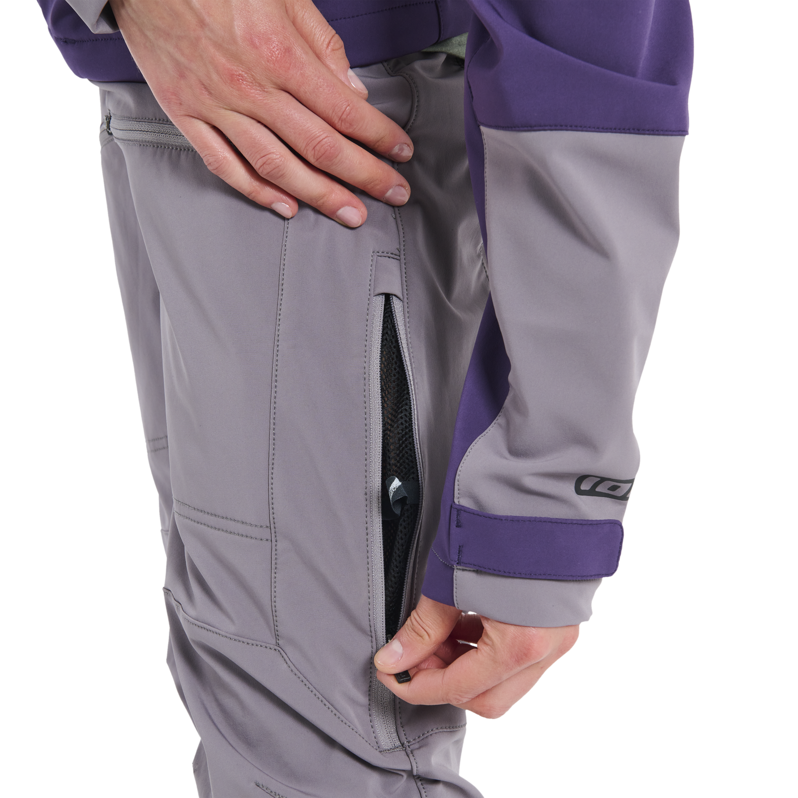 ION Bike Shelter 2L softshell pants women in grey and purple with thigh vent zip for mountain biking