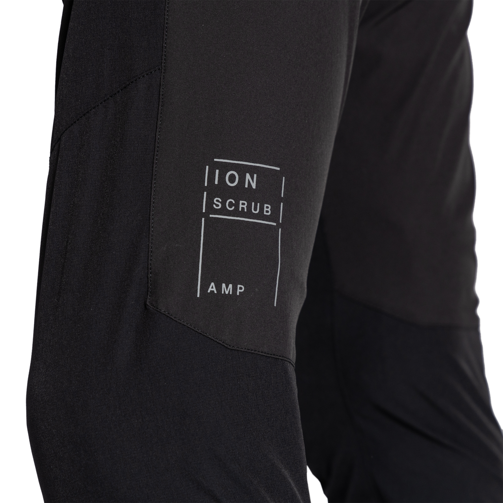 ION Scrub Amp women's bike pants in black – outer thigh panel detail