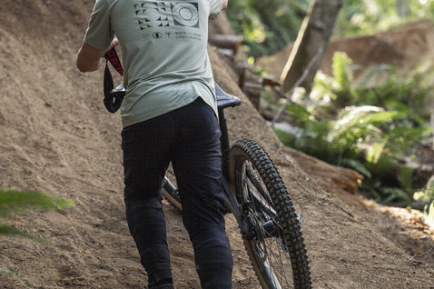 ION Bike Scrub Select MIPS fullface helmet during mountain biking on a forest trail