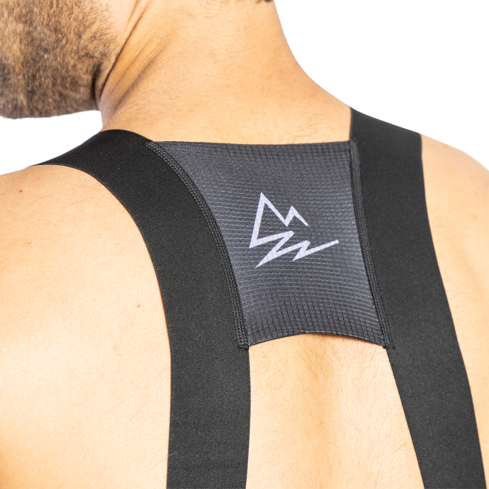 ION VNTR Amp bib shorts for men in black, back view with mesh panel, for gravel and bikepacking