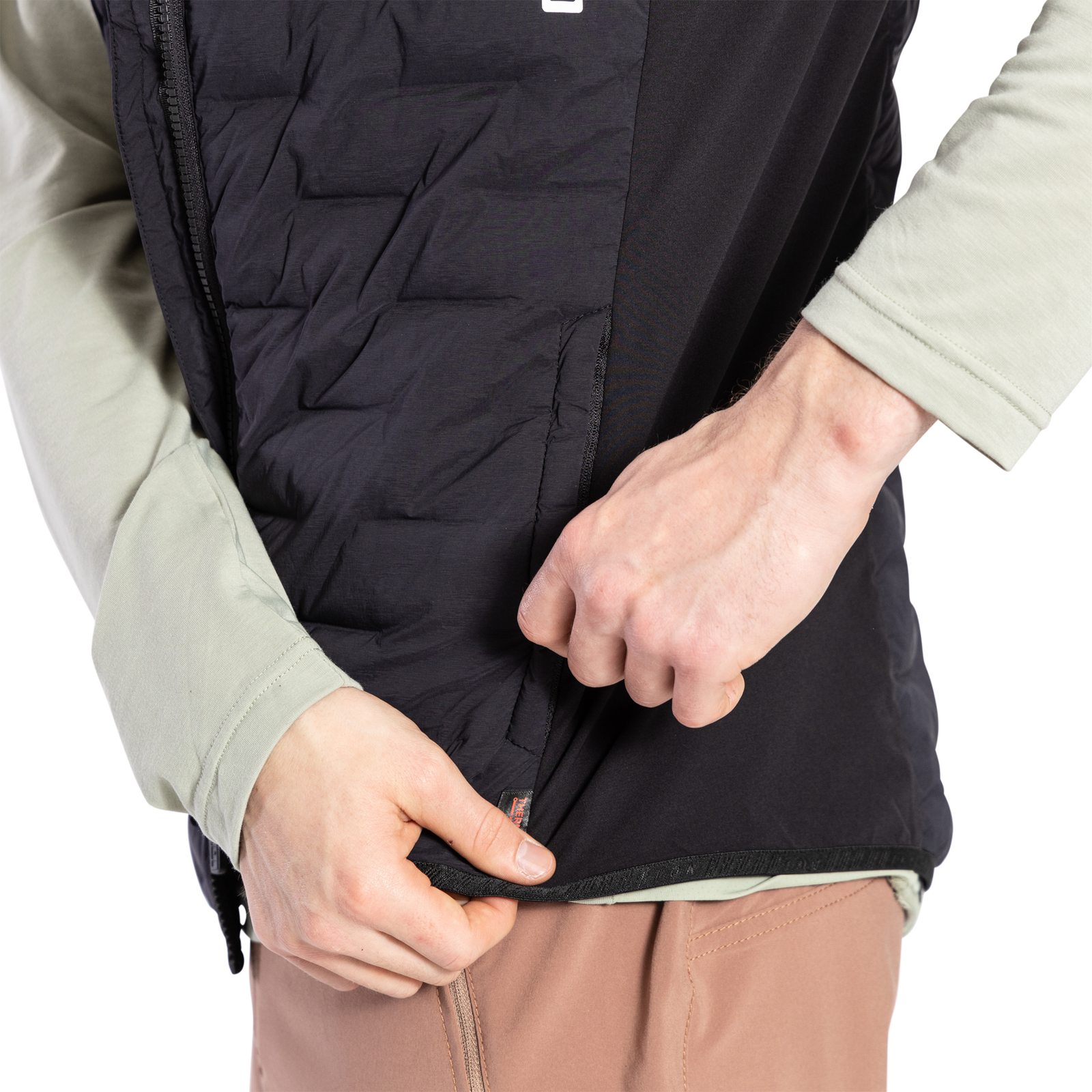 ION Bike Shelter Thermolite Hybrid cycling vest in black for mountain biking – side zip pocket detail