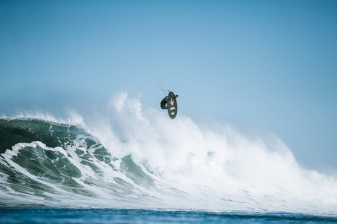 ION Water Ballistic Boots 3/2 Internal Split neoprene boots during wave riding on the ocean