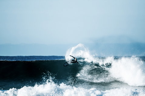 ION Surf Leash Core Ankle during wave riding in the ocean