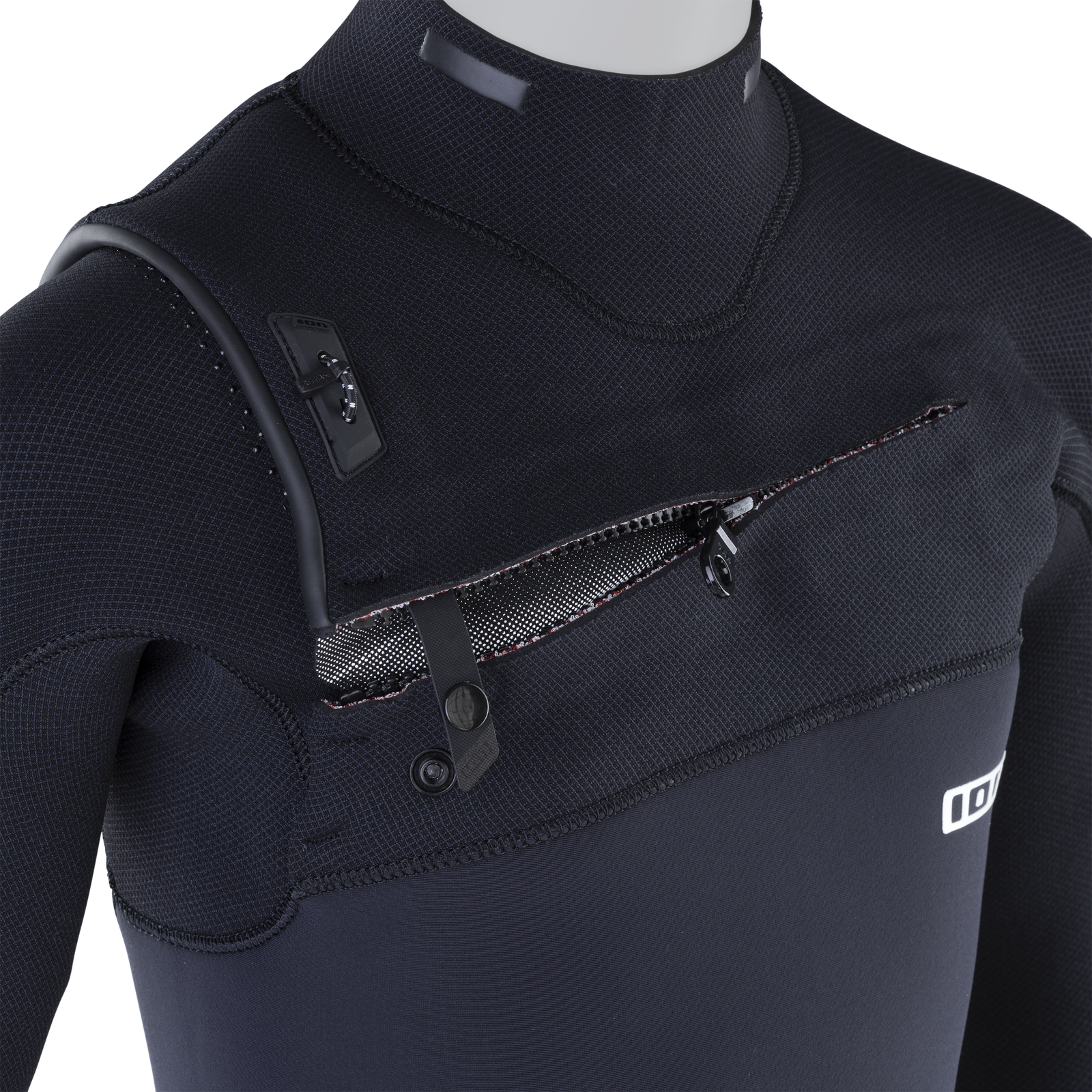 Combinaison junior ION Capture Amp 4/3 mm zip frontal en noir – détail fermeture poitrine