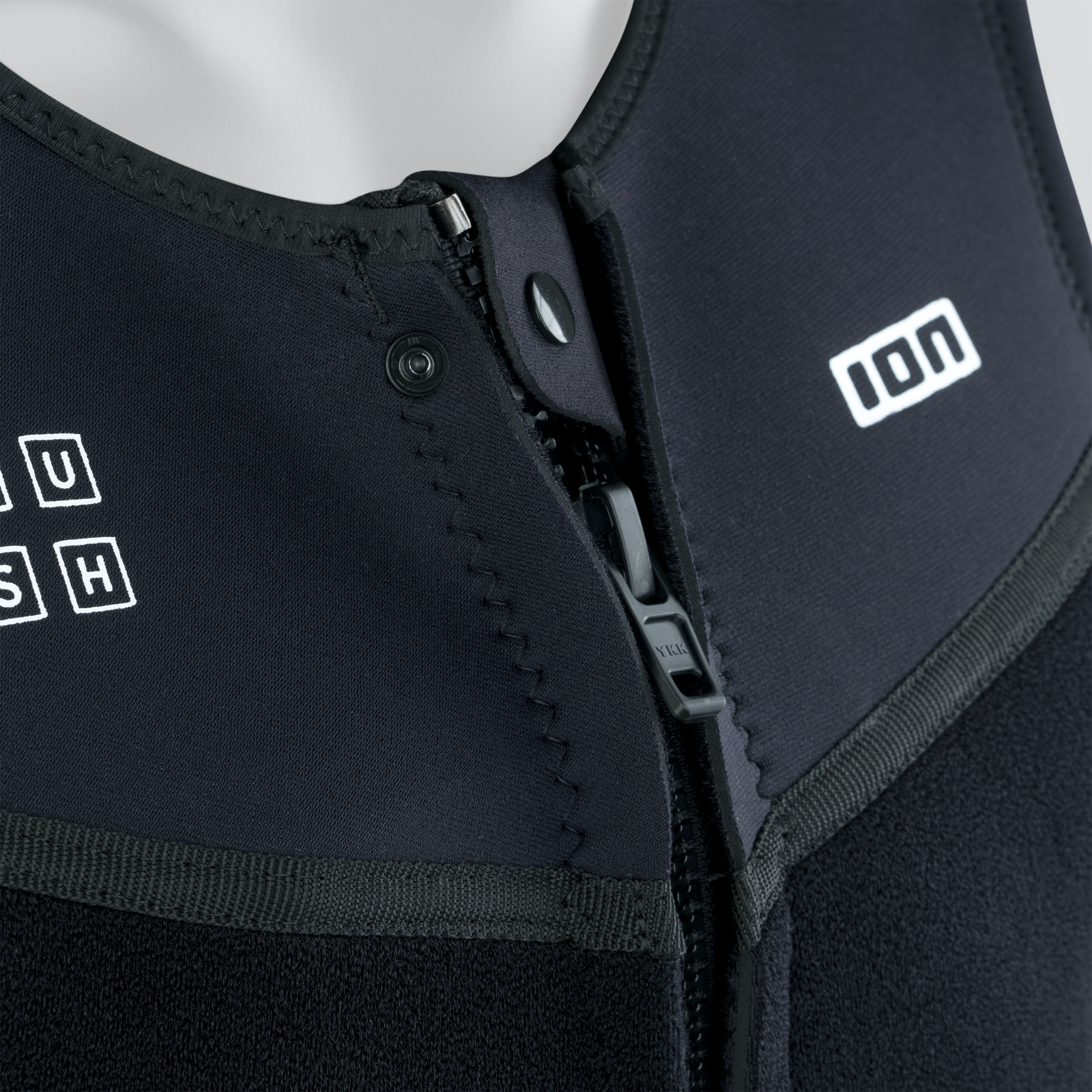 ION Rush wing vest harness in black with integrated chest plate and detachable harness