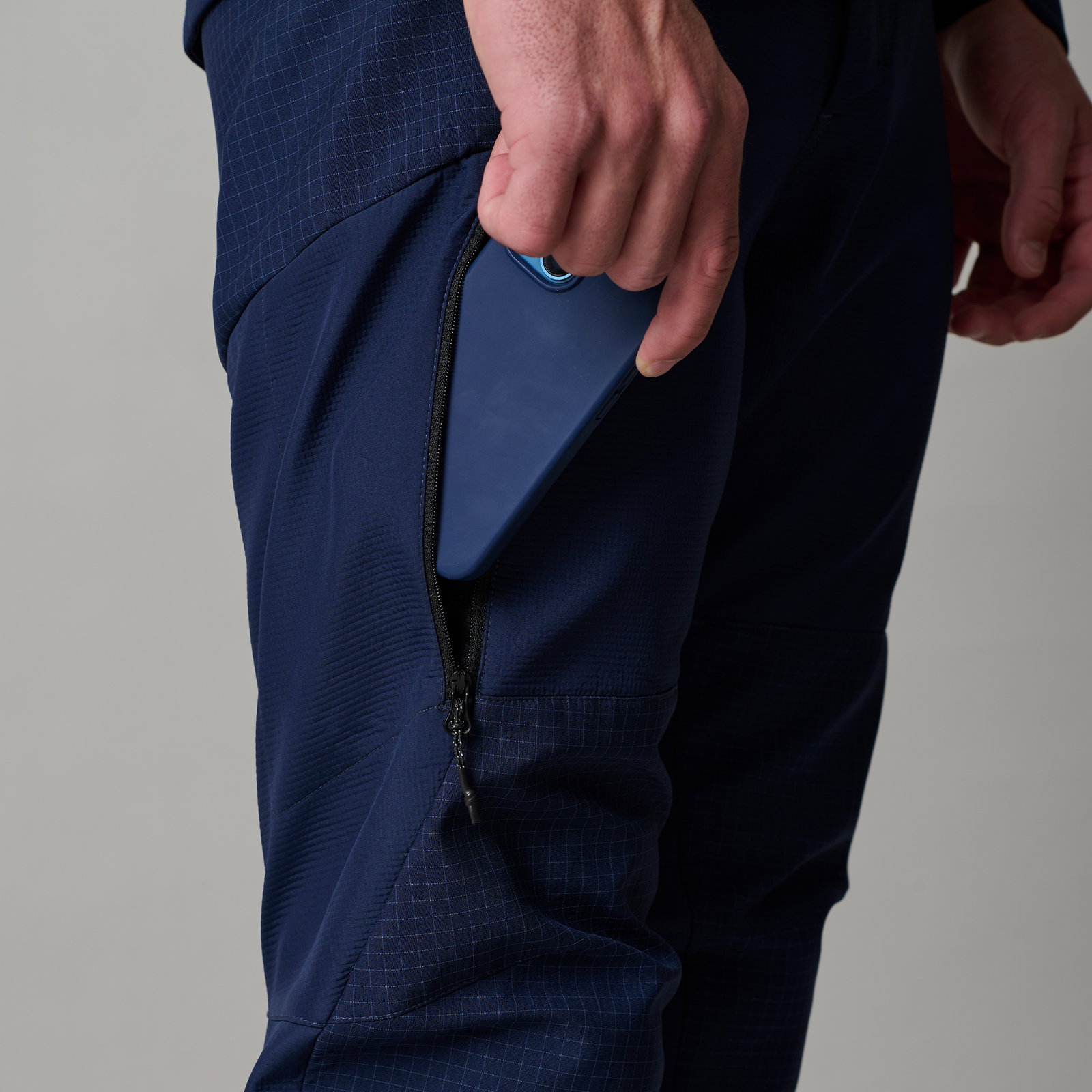 ION Bike Shelter 2L softshell pants men in navy – zip side pocket detail for mountain biking