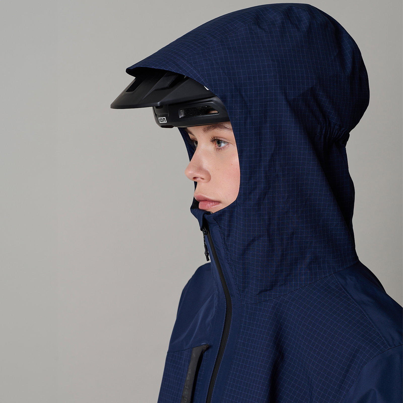 ION Bike Shelter 3L cycling jacket in navy blue with helmet-compatible hood for mountain biking