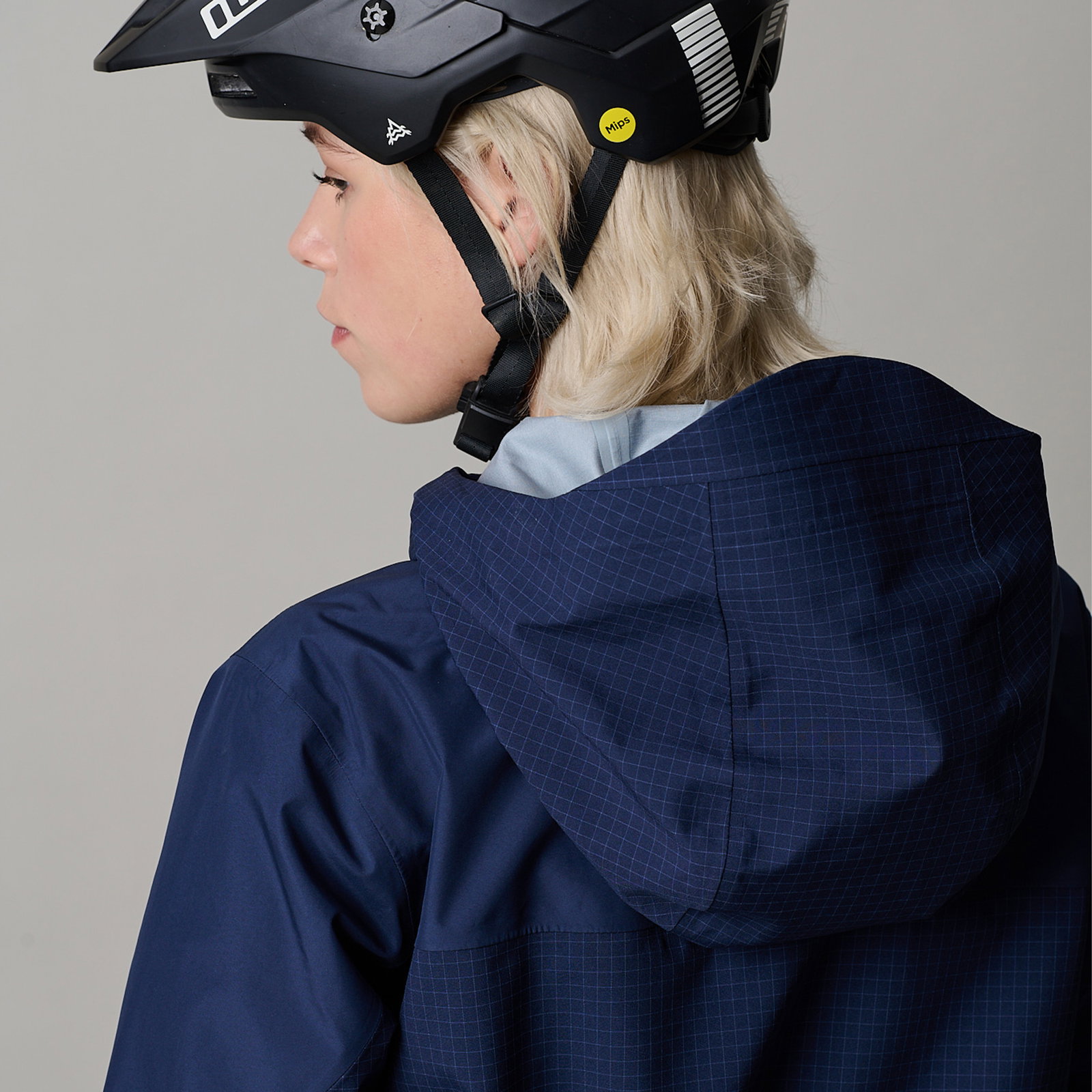 ION Bike Shelter 3L cycling jacket in navy blue for enduro and mountain biking with helmet-compatible hood