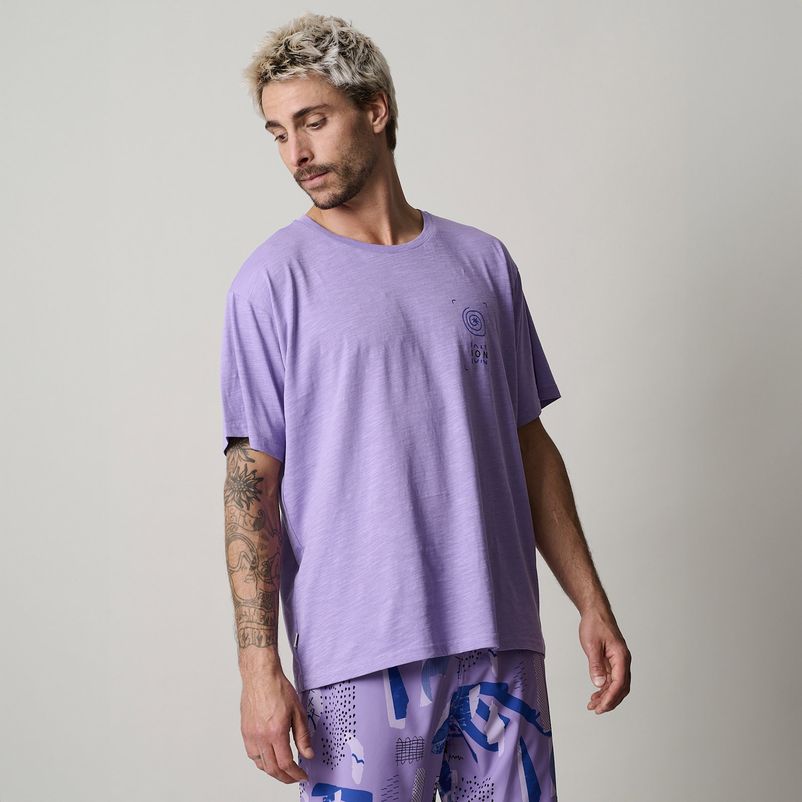 ION Addicted SS men's t-shirt in lavender with small chest print, worn on model