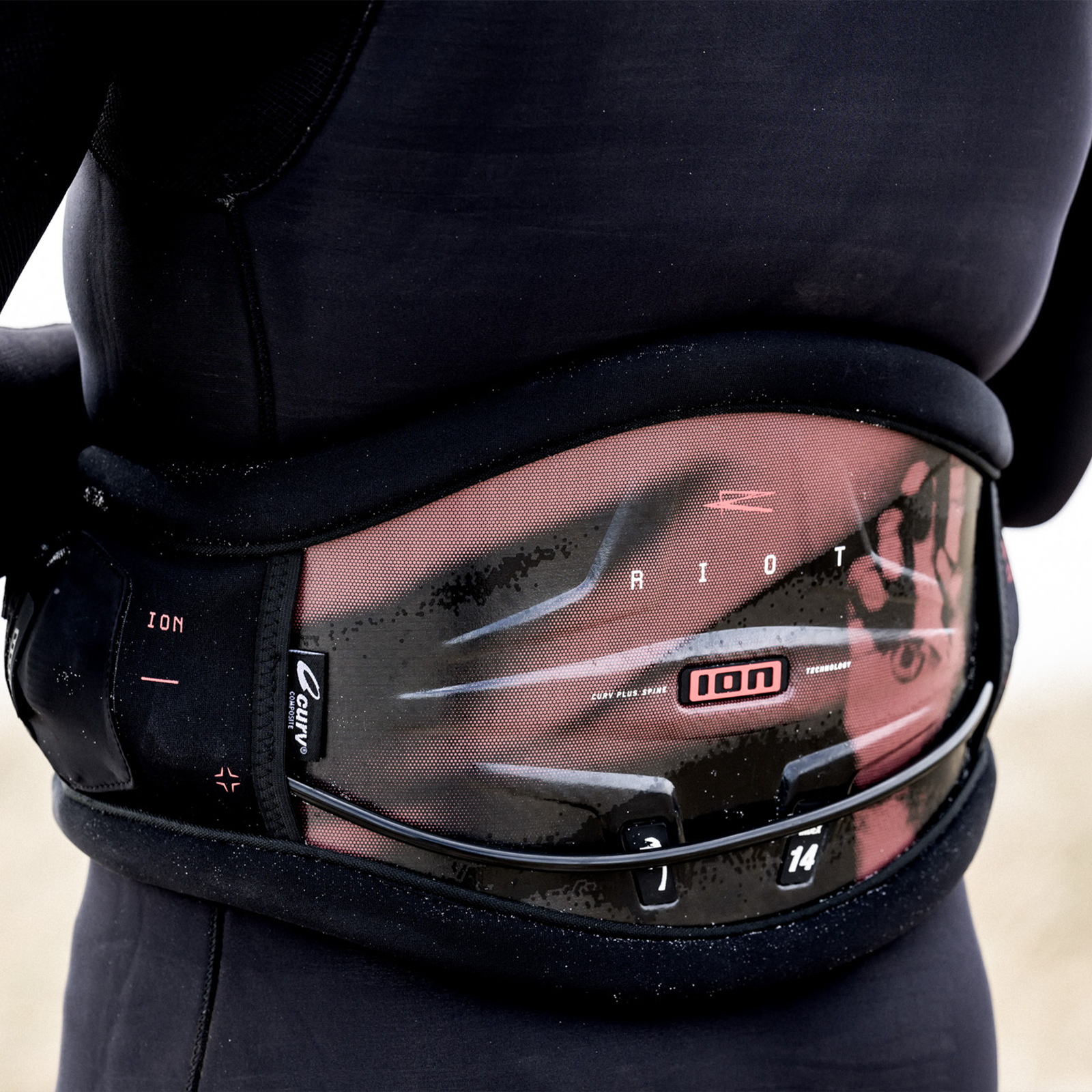 ION Riot Curv waist harness in black with CURV® composite back plate for kiteboarding