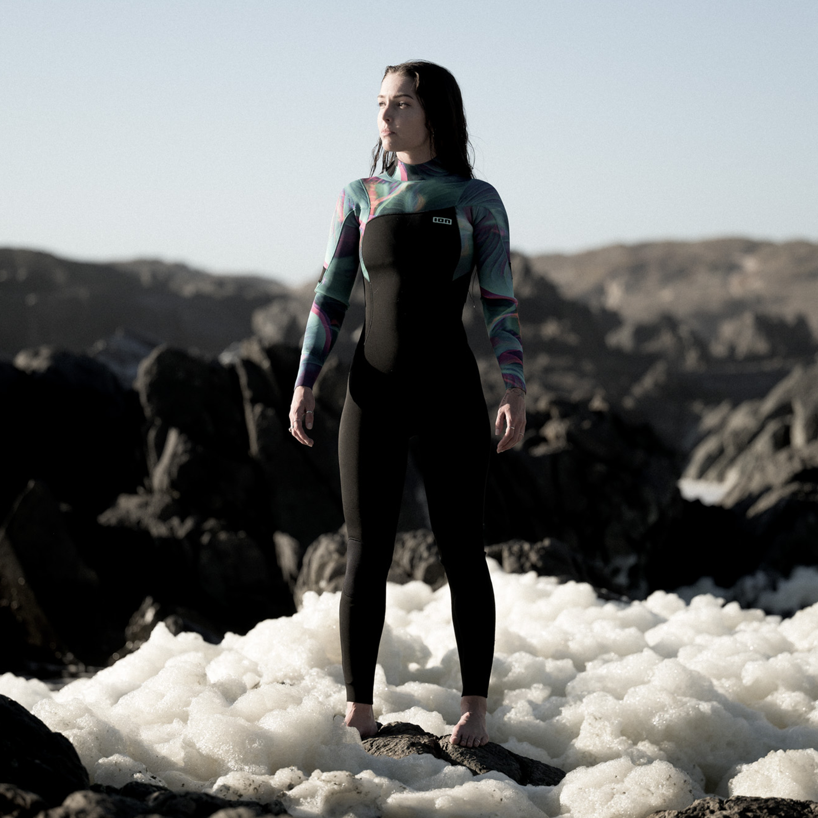 ION Amaze Core 5/4mm back-zip fullsuit wetsuit in black with teal and grey print