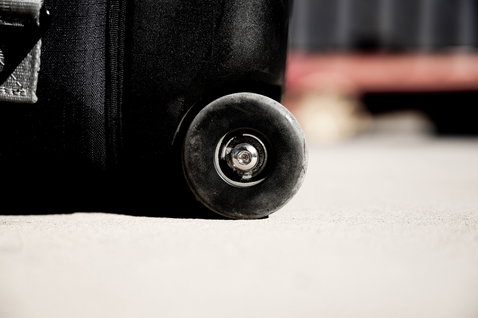 ION Carry-on Wheelie luggage wheel detail in black