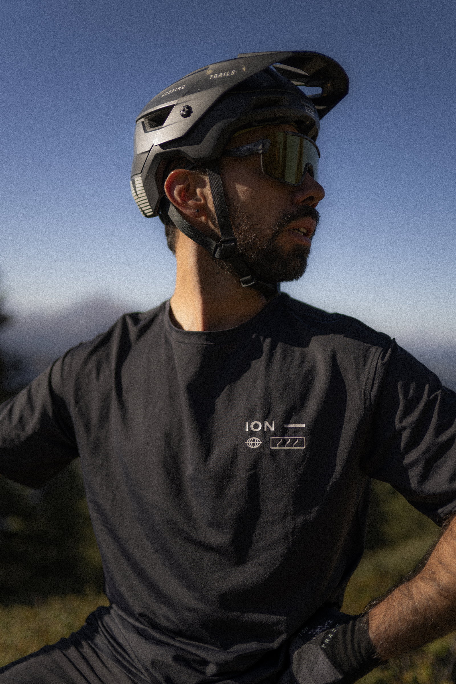ION Bike Ionic Graphic SS cycling jersey in black during mountain biking in the mountains