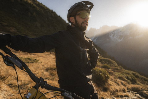 ION Bike Shelter 2L softshell MTB pants in black during mountain biking in the Alps