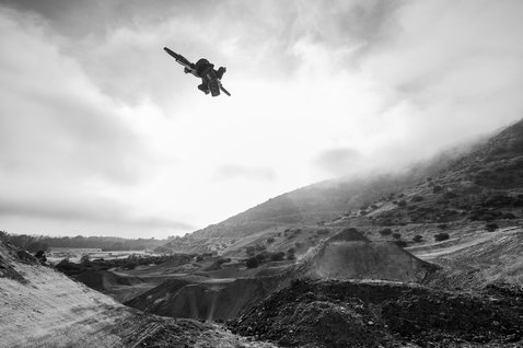 ION Bike ARCON HD Pro chest protector during freeride mountain biking at a dirt jump park