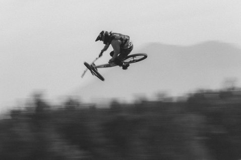 ION Bike ARCON HD Pro chest protector during freeride mountain biking mid-air action
