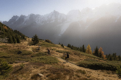 ION Bike Ionic LT bike pants during mountain biking on an alpine trail in autumn