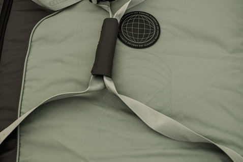ION Gearbag Core kite gear bag in olive green and sage with quick-release buckle straps