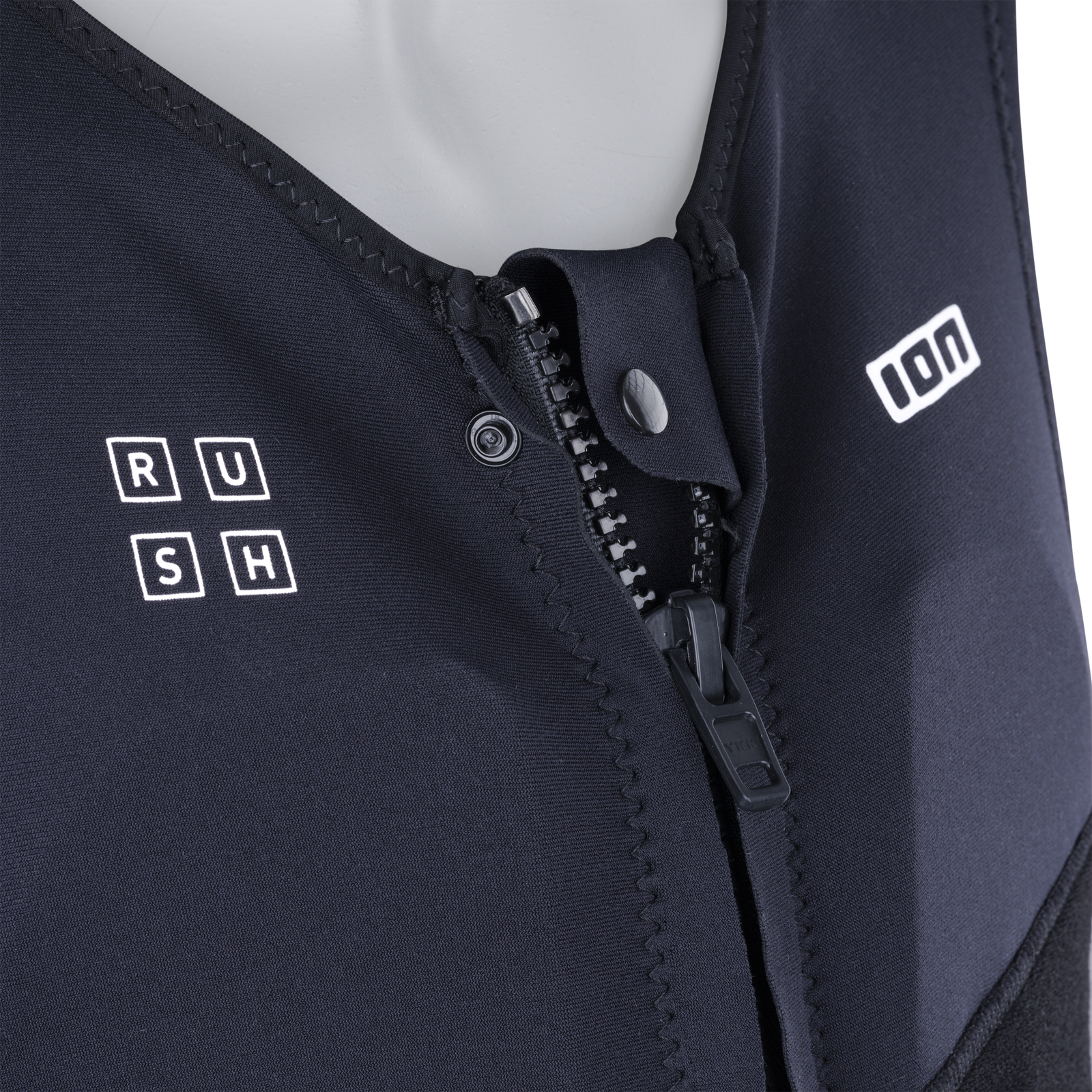 ION Rush vest harness in dark charcoal with front zip closure for wing foiling