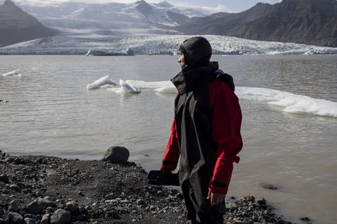 ION Fuse Lightweight Drysuit back zip unisex in black and red during watersports at a glacial lagoon in Iceland