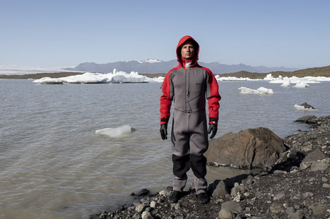 ION Fuse Drysuit 4/3mm back-zip drysuit in charcoal grey and red during watersports in Iceland