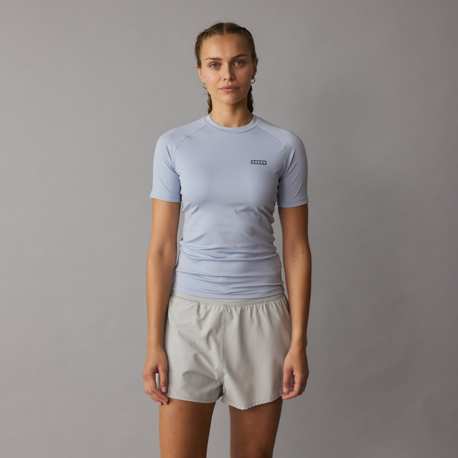 ION short sleeve rashguard women in mist blue with raglan sleeves and UV protection
