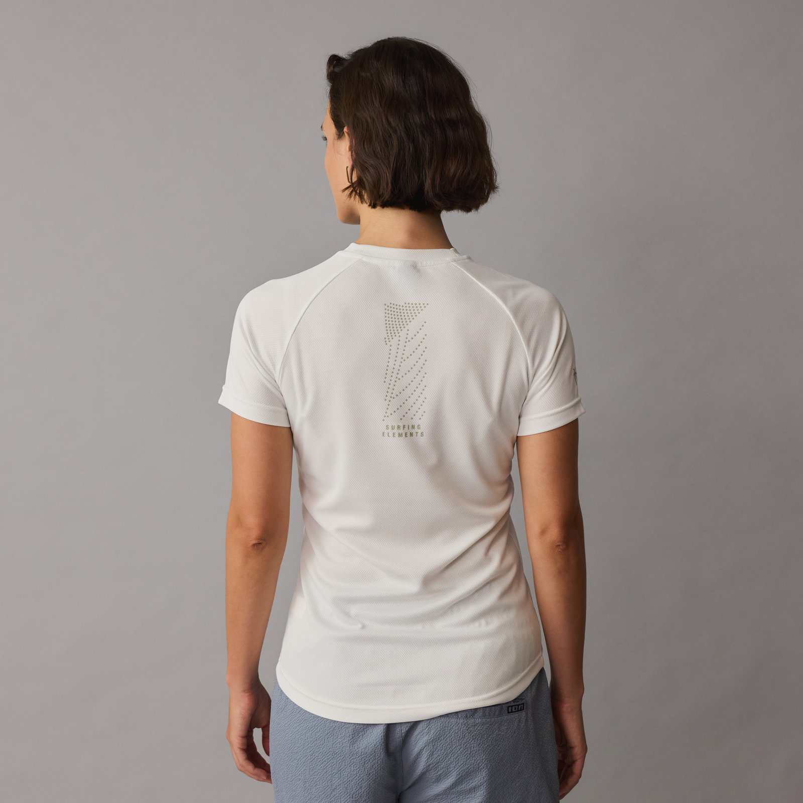 ION Wetshirt SS women short-sleeve rashguard in off-white with back graphic — rear view
