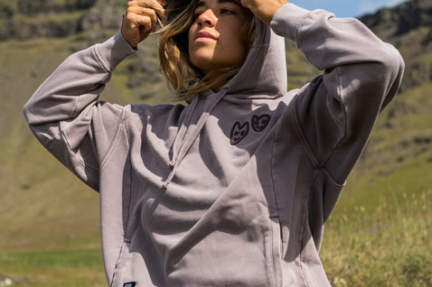 ION No Bad Days women's hoodie in driftwood worn outdoors in mountain landscape