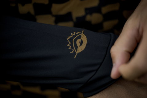 ION Maze long-sleeve rashguard men in black with gold logo detail