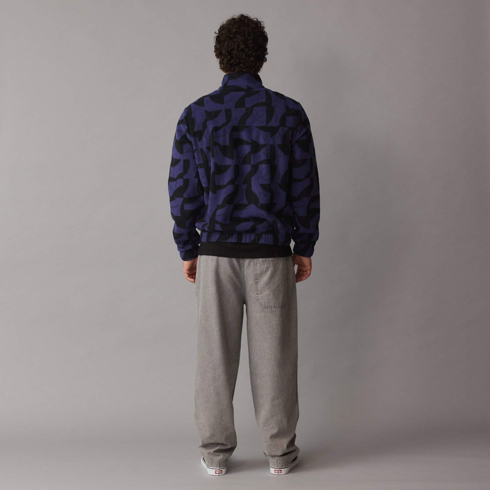 ION Jacket HD Fleece unisex in deep water geometric print, back view on model