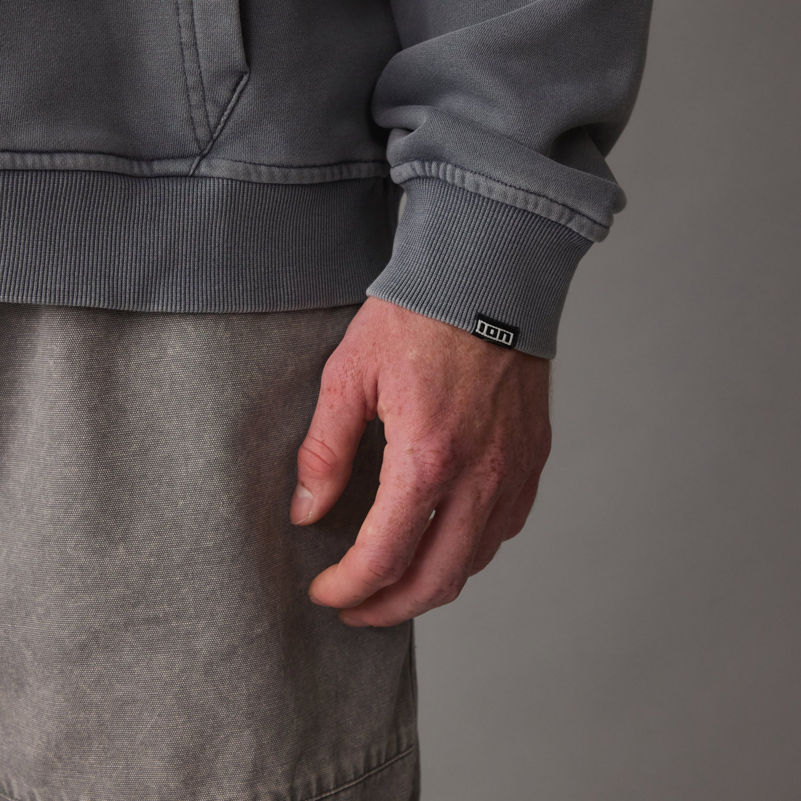 ION Hoody Surfing Elements men's hoodie in slate grey — sleeve cuff detail with ION label