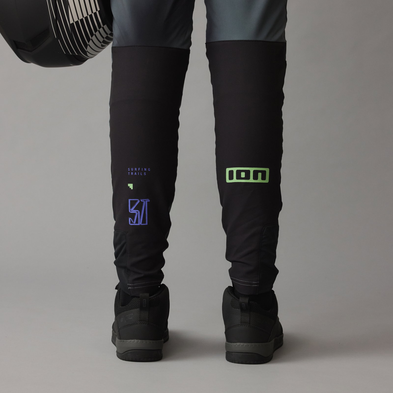 ION Bike Scrub UTAH freeride MTB pants in black with lime and purple accents for mountain biking