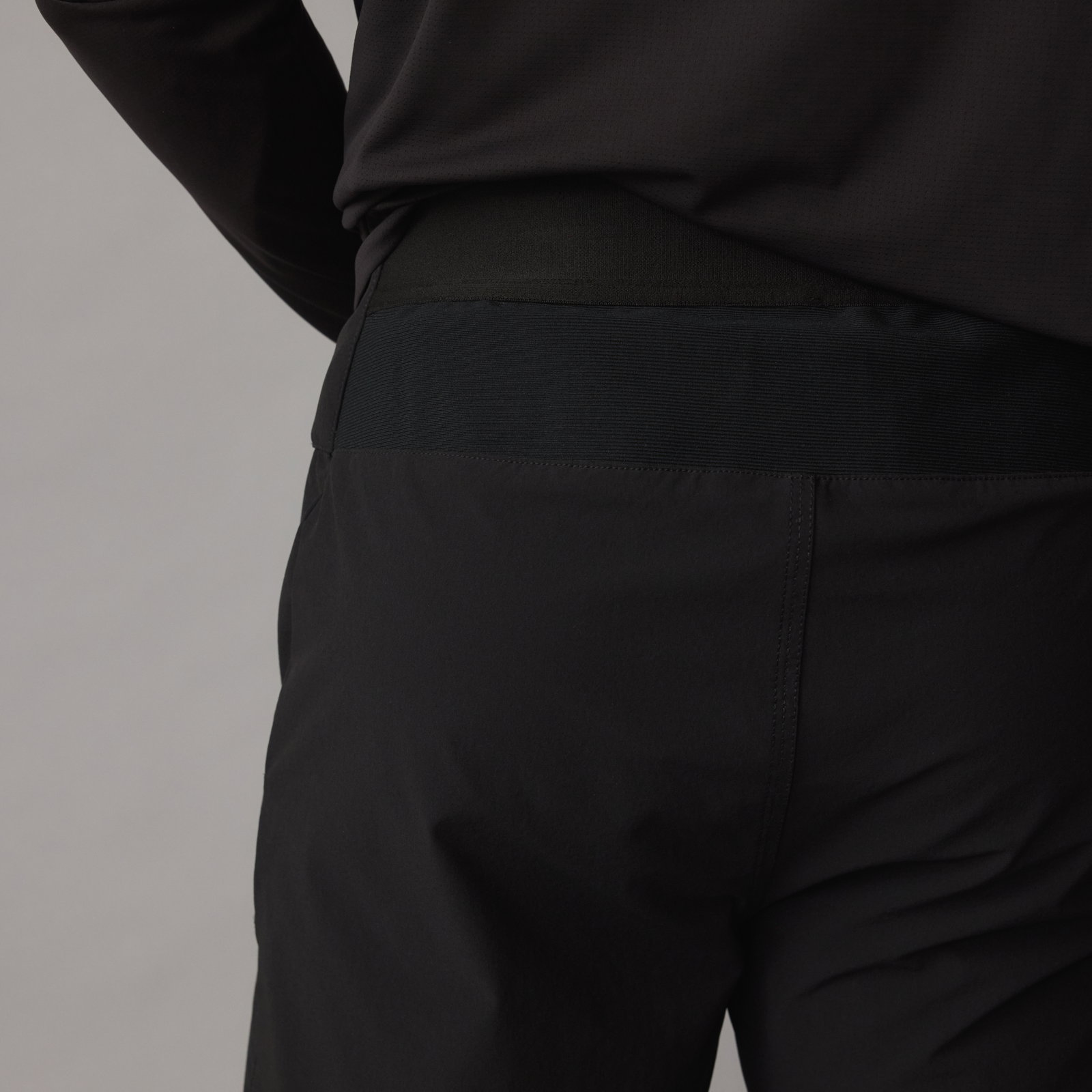 ION Bike Scrub Pants in black back view showing elastic waistband for mountain biking